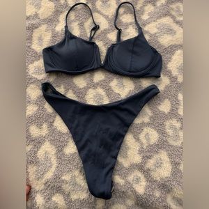 Navy swimsuit, thong bottoms, never worn!